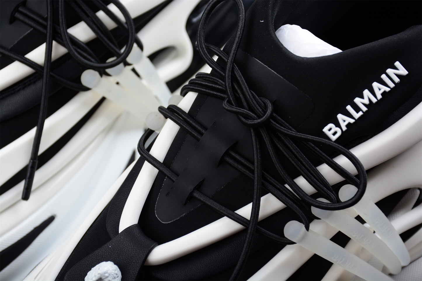 Balmain Unicorn Low-Top Sneakers in White/Black – Neoprene & Leather - Best Reps Website 2025