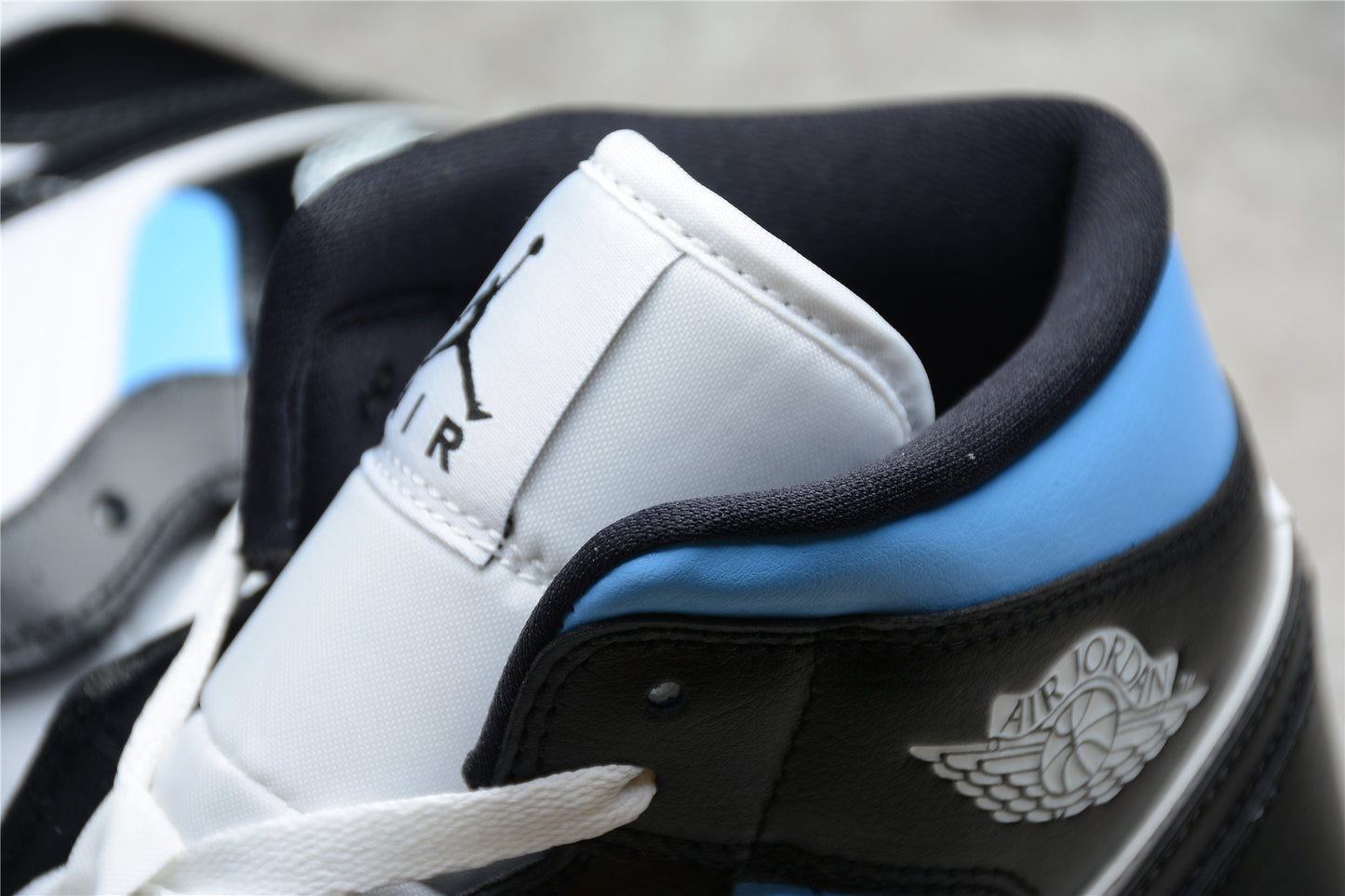 Air Jordan 1 Mid "University Blue Black" - Best Reps Website 2025