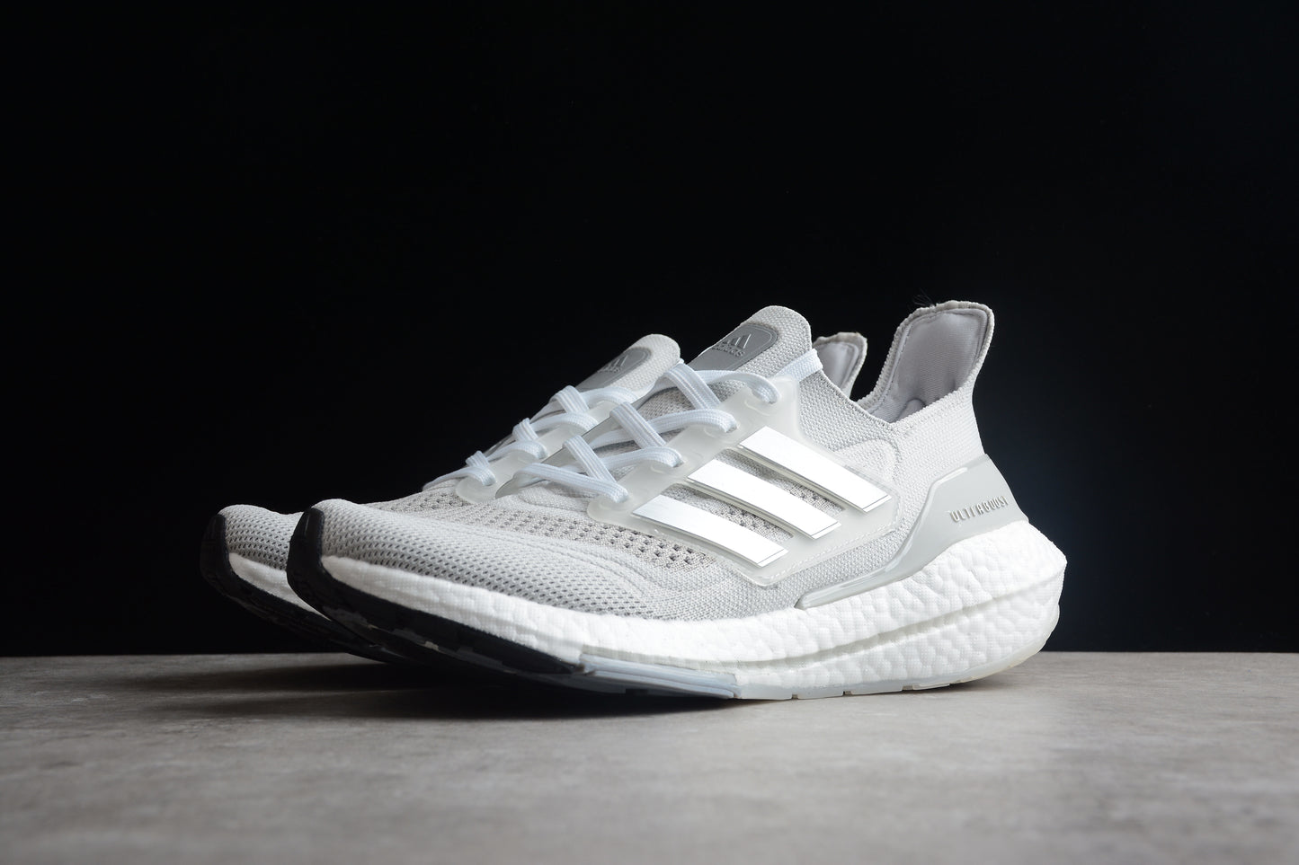 adidas Ultra Boost 21 Triple White Cloud.