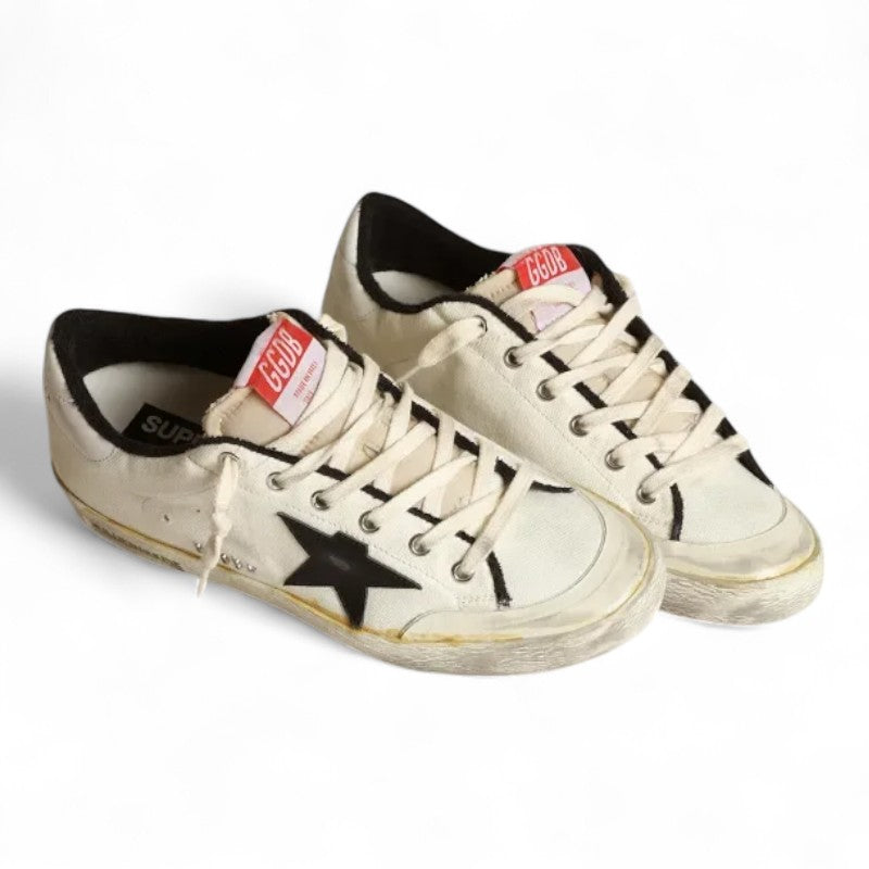 The Super-Star LTD sneakers in beige canvas with a black leather star and white leather heel tab - Best Reps Website 2025