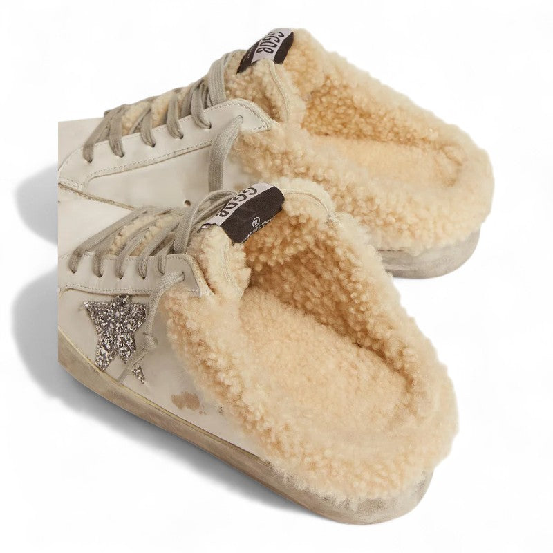 The Super-Star Sabot in white leather with shearling lining