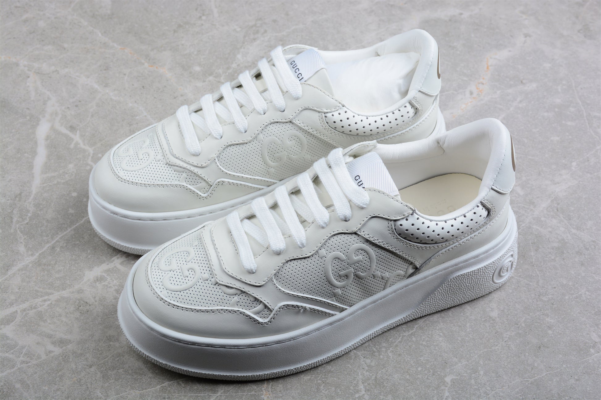 Gucci Embossed GG Logo Sneaker "White" - Best Reps Website 2025