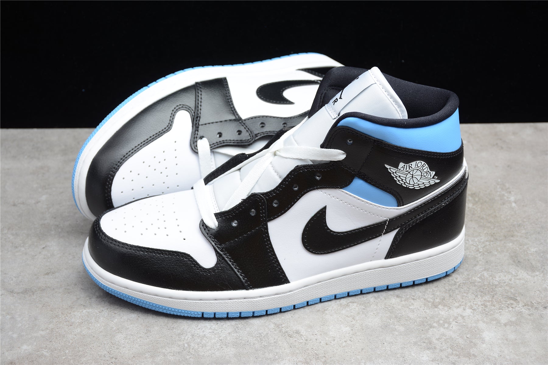 Air Jordan 1 Mid "University Blue Black" - Best Reps Website 2025