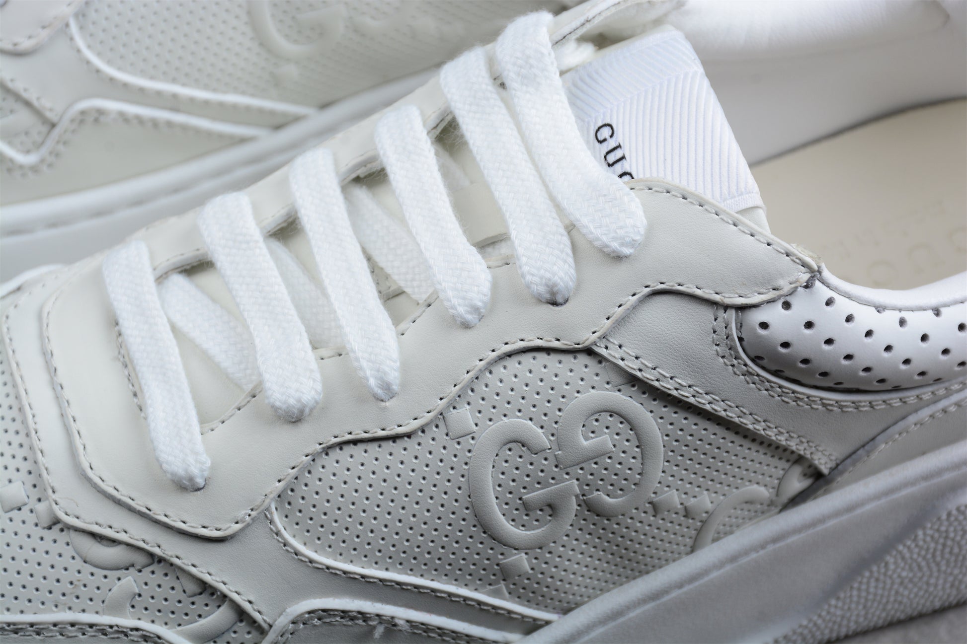 Gucci Embossed GG Logo Sneaker "White" - Best Reps Website 2025