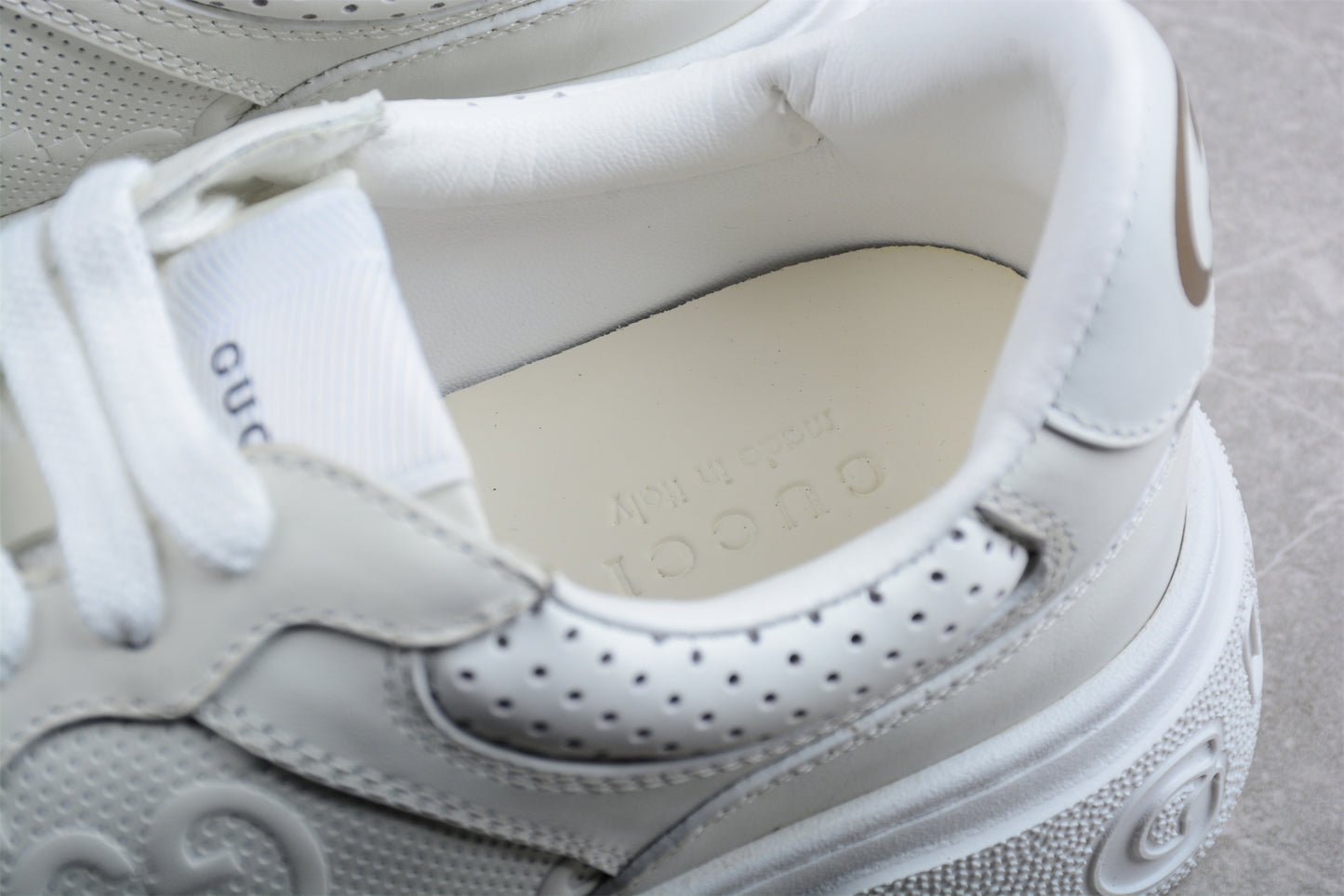 Gucci Embossed GG Logo Sneaker "White" - Best Reps Website 2025