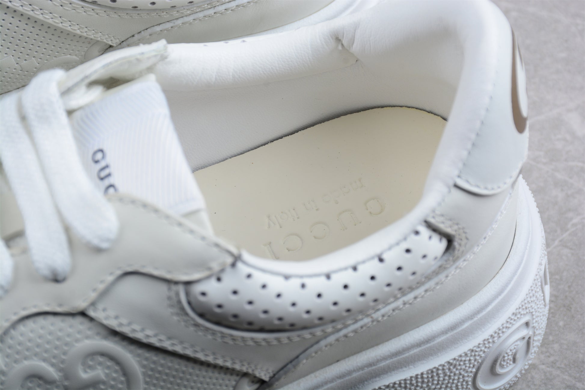 Gucci Embossed GG Logo Sneaker "White" - Best Reps Website 2025
