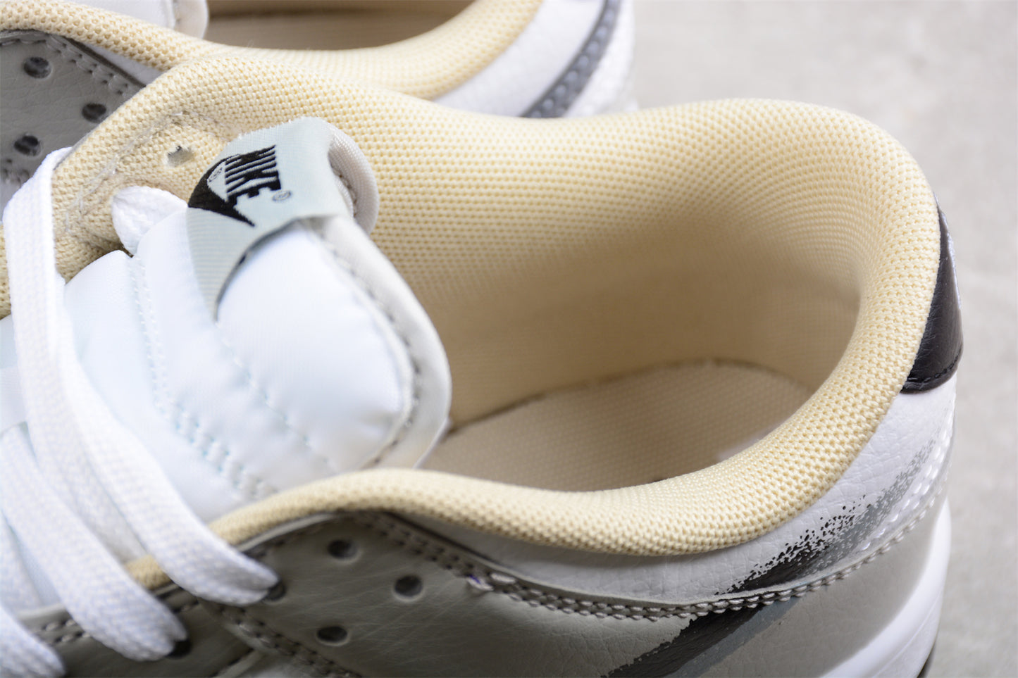 Nike Dunk Low "Spray Paint" Swoosh Gray