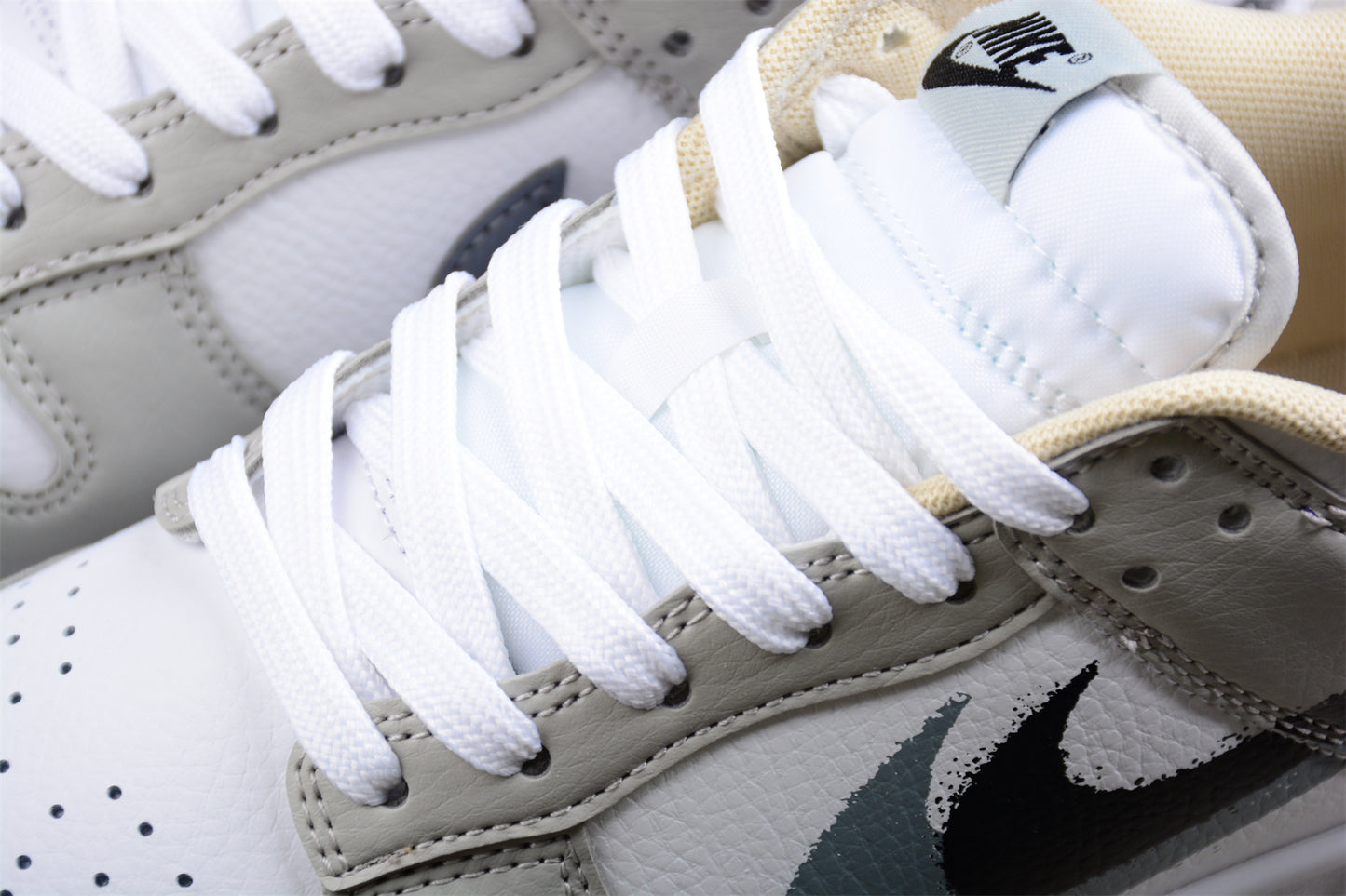 Nike Dunk Low "Spray Paint" Swoosh Gray