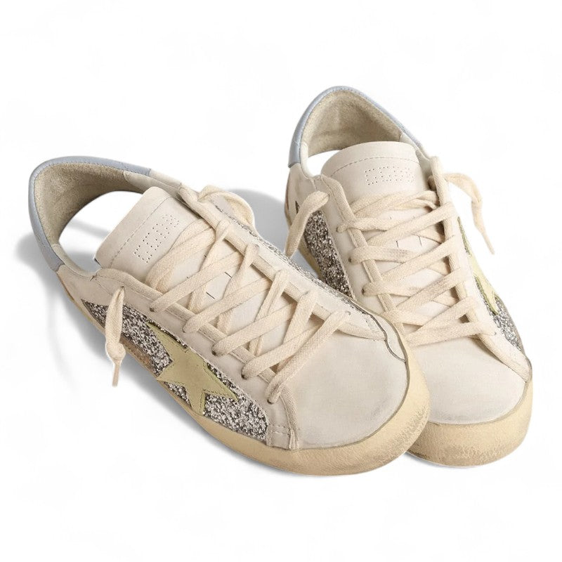 Bio-based Super-Star sneakers with silver glitter and a yellow leather star