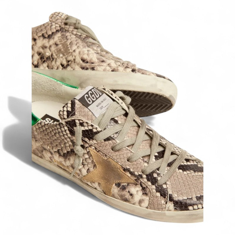 The Super-Star LTD sneakers feature a snake-print leather upper paired with a green laminated leather heel tab - Best Reps Website 2025