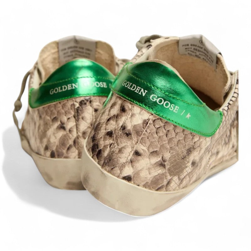 The Super-Star LTD sneakers feature a snake-print leather upper paired with a green laminated leather heel tab - Best Reps Website 2025