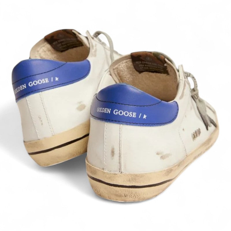 The Super-Star sneakers with a black snake-print leather star and blue leather heel tab - Best Reps Website 2025