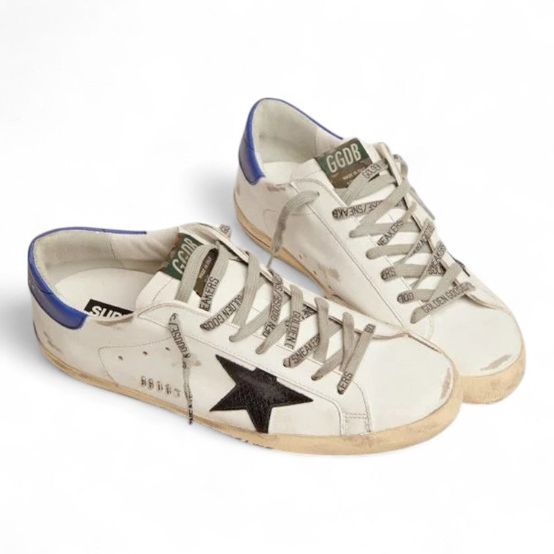 The Super-Star sneakers with a black snake-print leather star and blue leather heel tab - Best Reps Website 2025